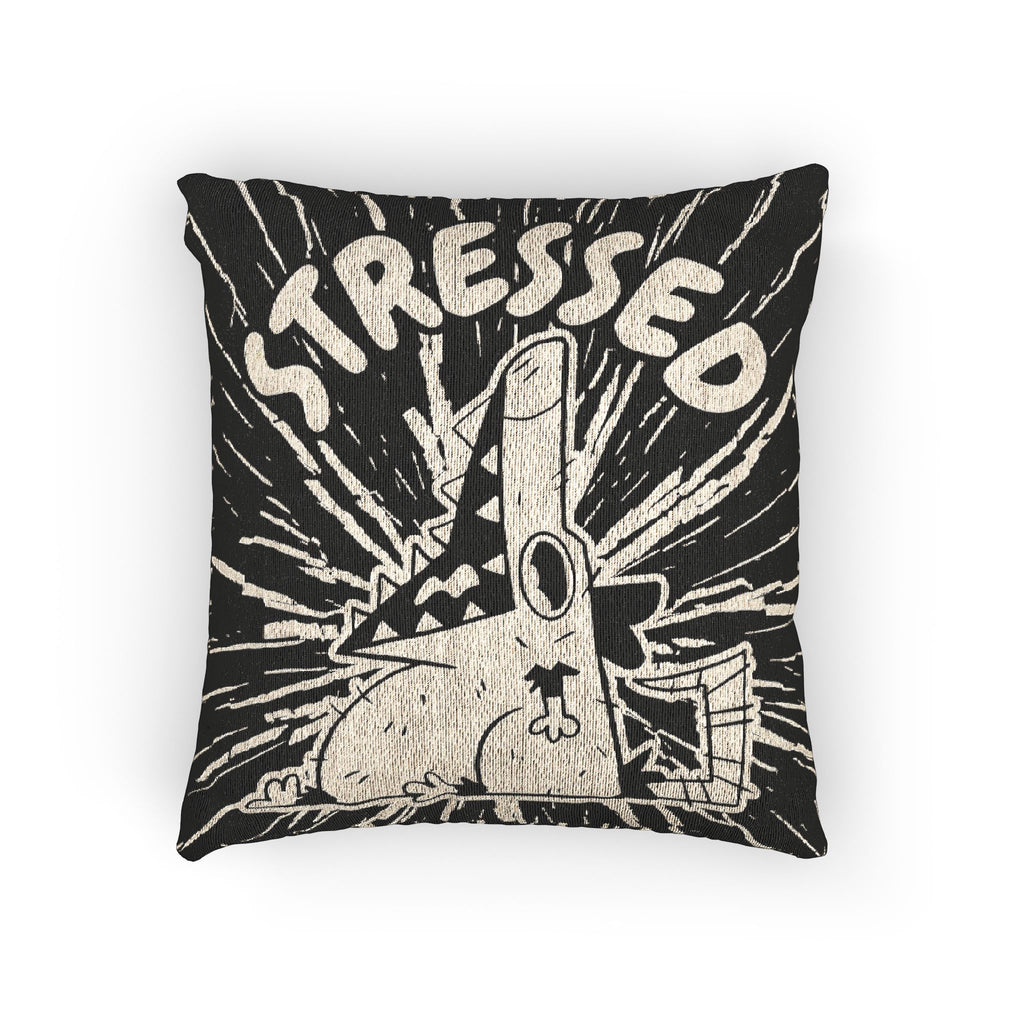 Pillow with cartoon character and 'STRESSED' text on a black background